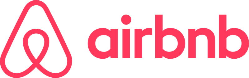Airbnb logo in coral pink